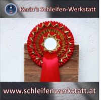 Rote Weltmeisterschleife mit Metallicband aus Karin&#039;s Schleifen-Werkstatt