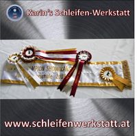 Sch&auml;rpe mit Metallicband und Siegerschleifen aus Karin&#039;s Schleifen-Werkstatt